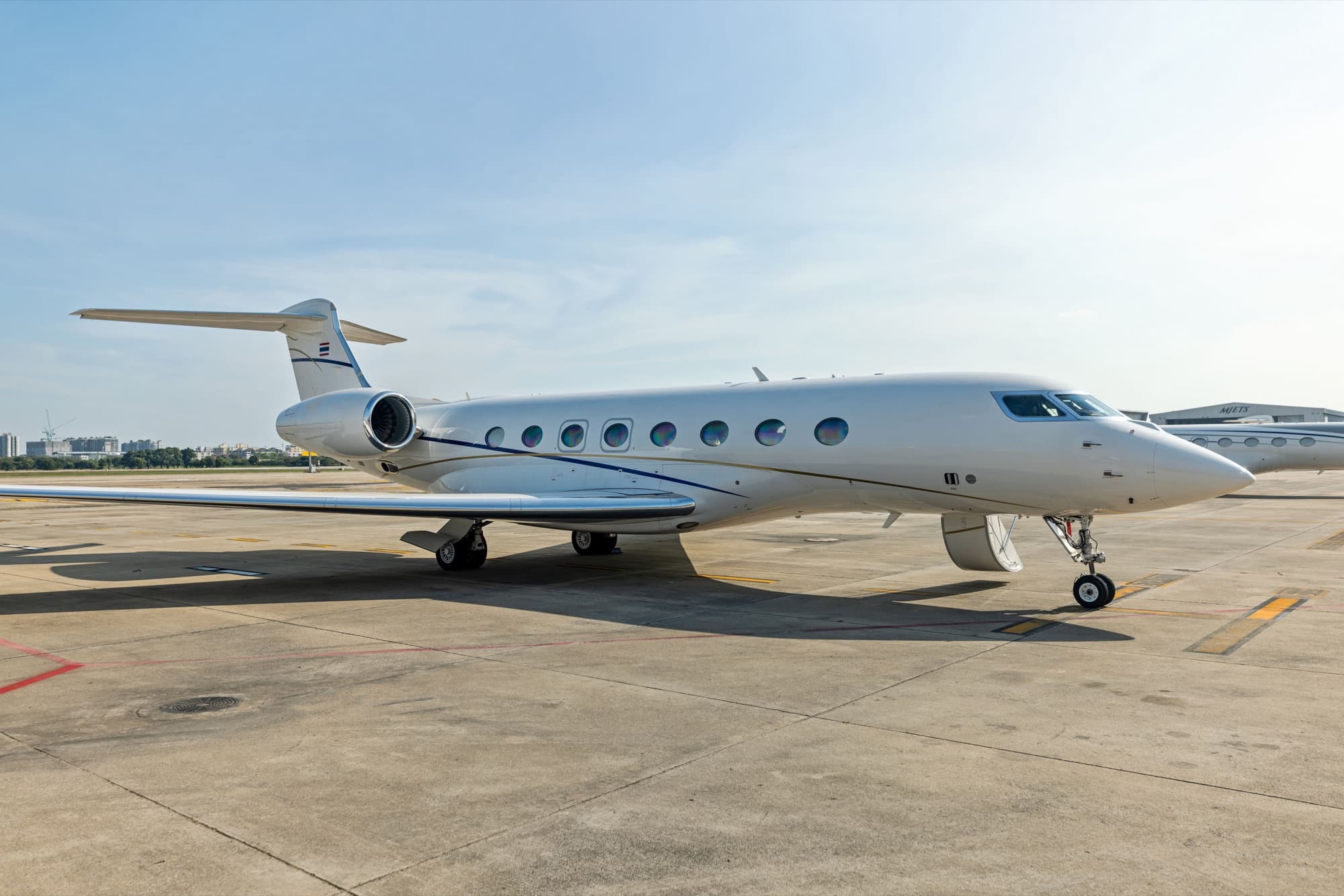 Gulfstream G650 full side profile parked on the ramp
